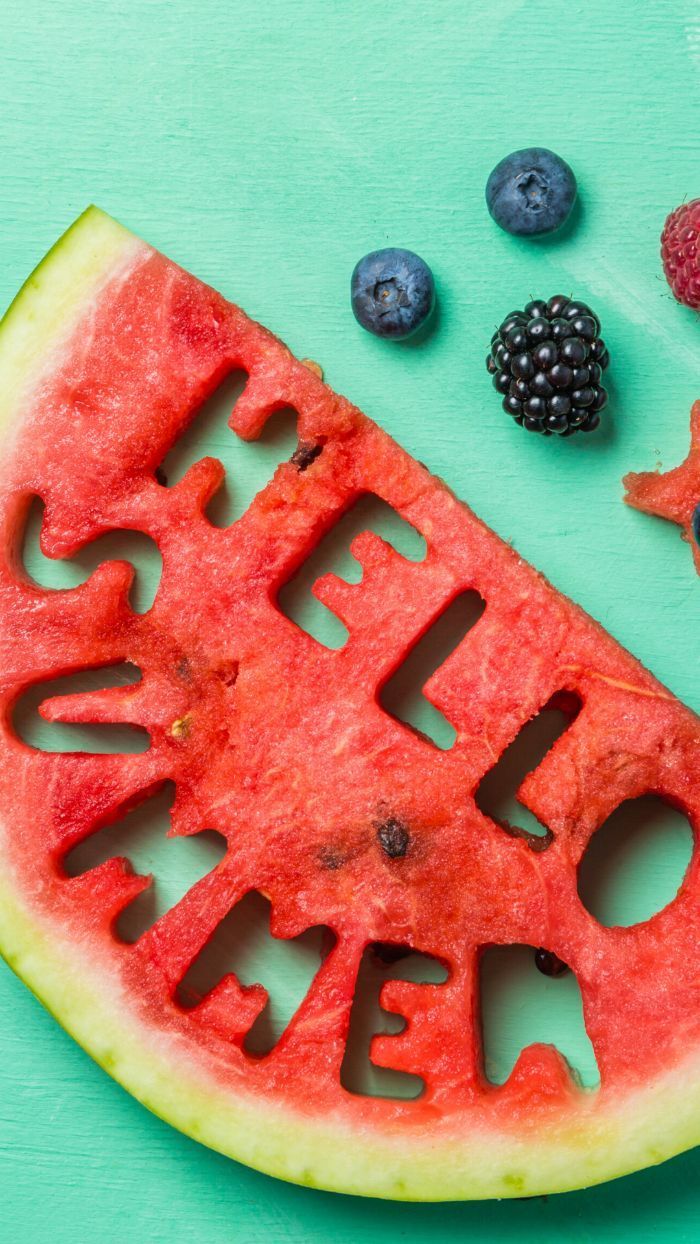 A slice of watermelon with the word 