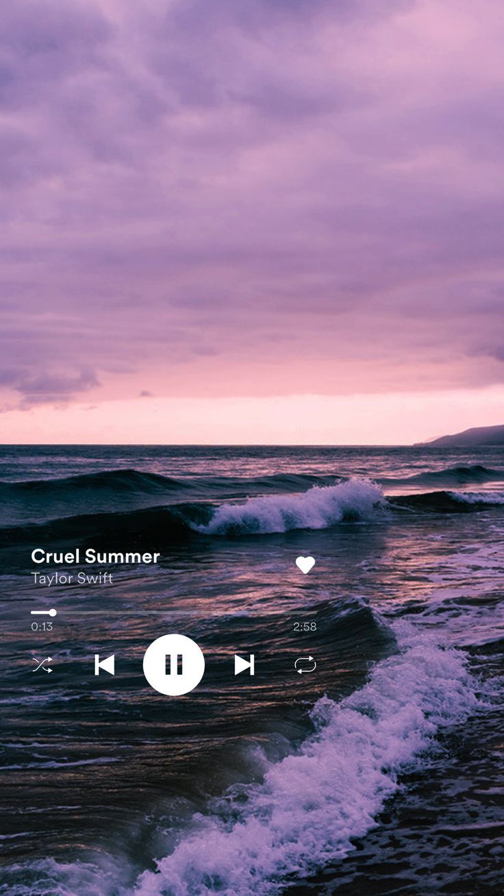 An image of the ocean with purple hues and the song 