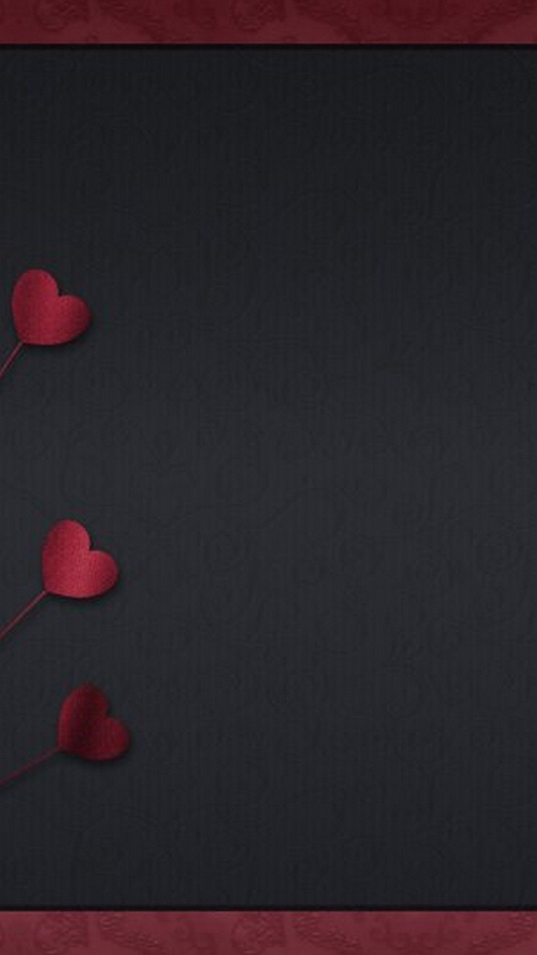 A black background with a red frame and three red hearts. - Dark red
