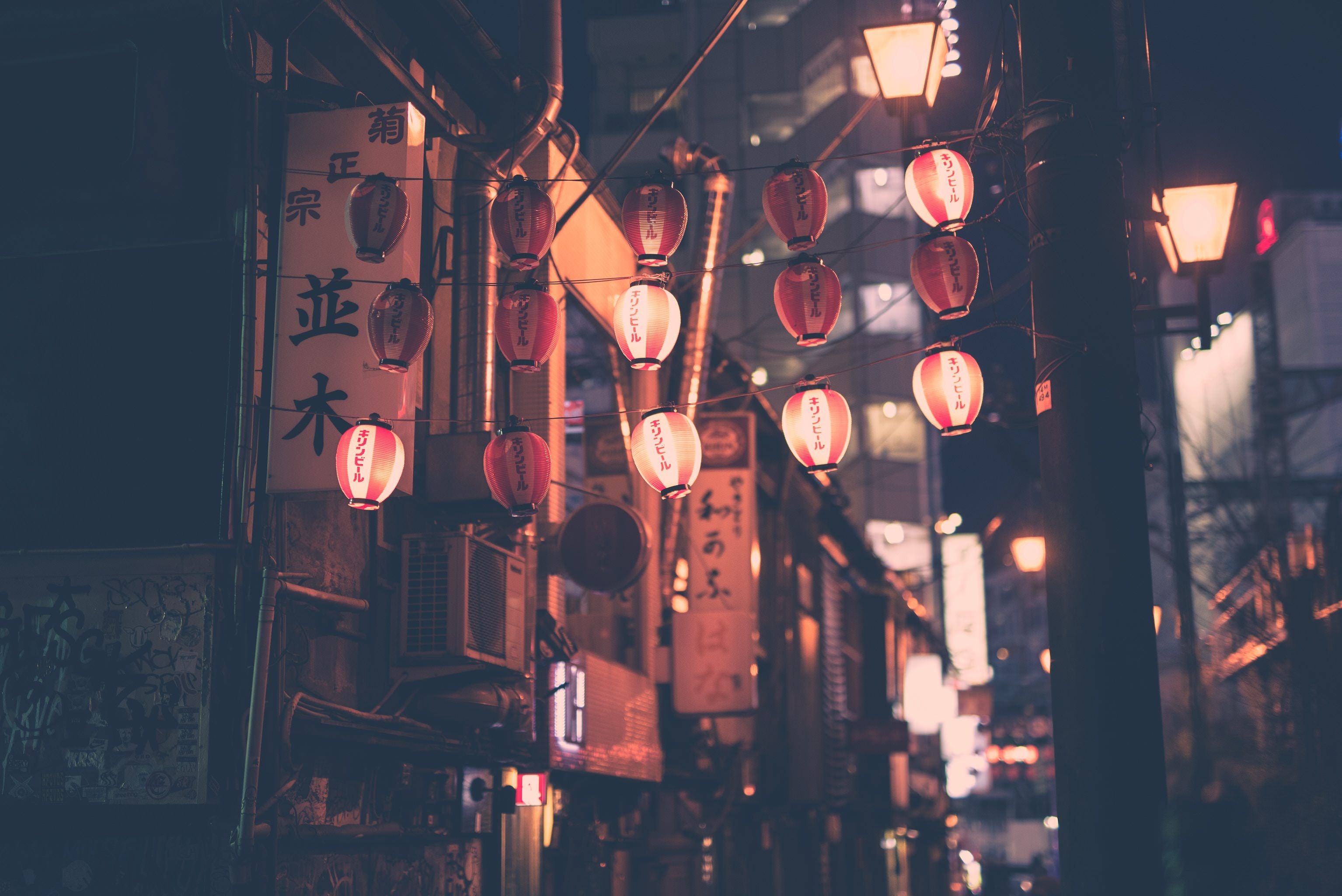 A street with lights and buildings in the background - Tokyo, Japan, Japanese