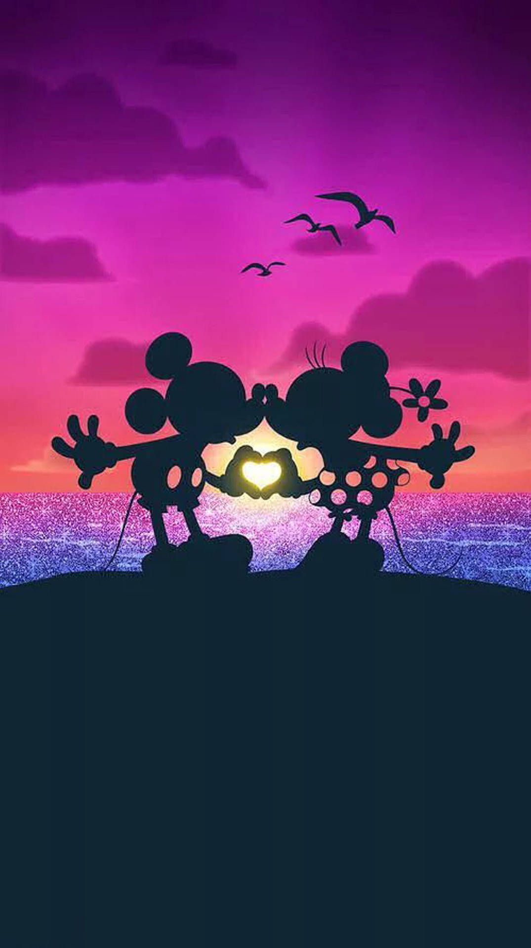 Mickey and Minnie Mouse holding hands in front of a sunset - Minnie Mouse