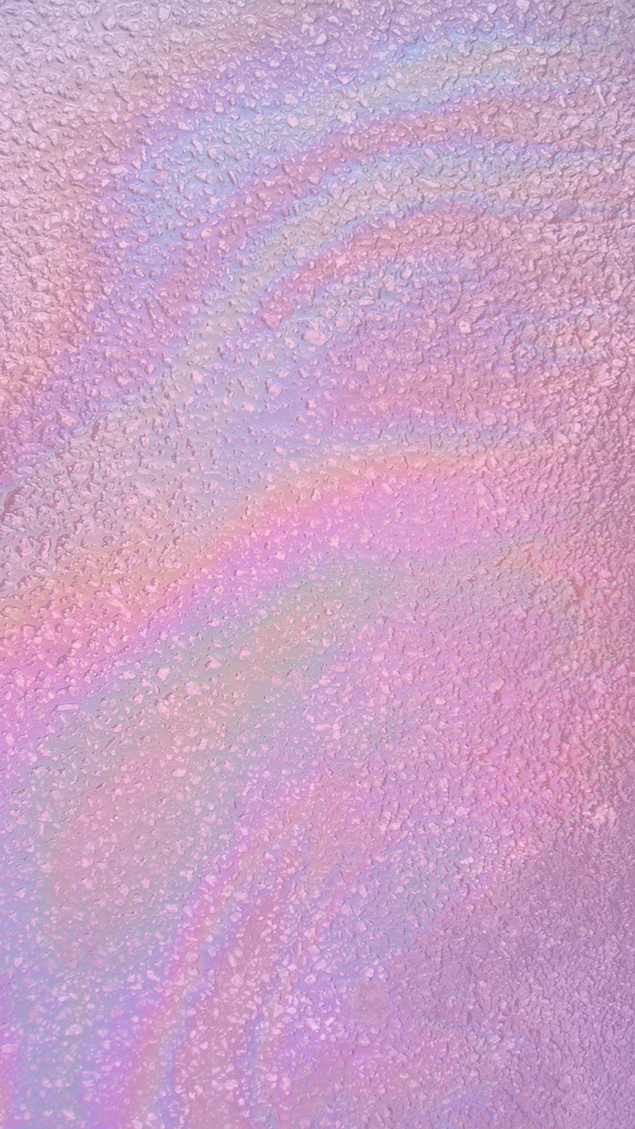 A pink and purple marble background with a rainbow sheen - Slime