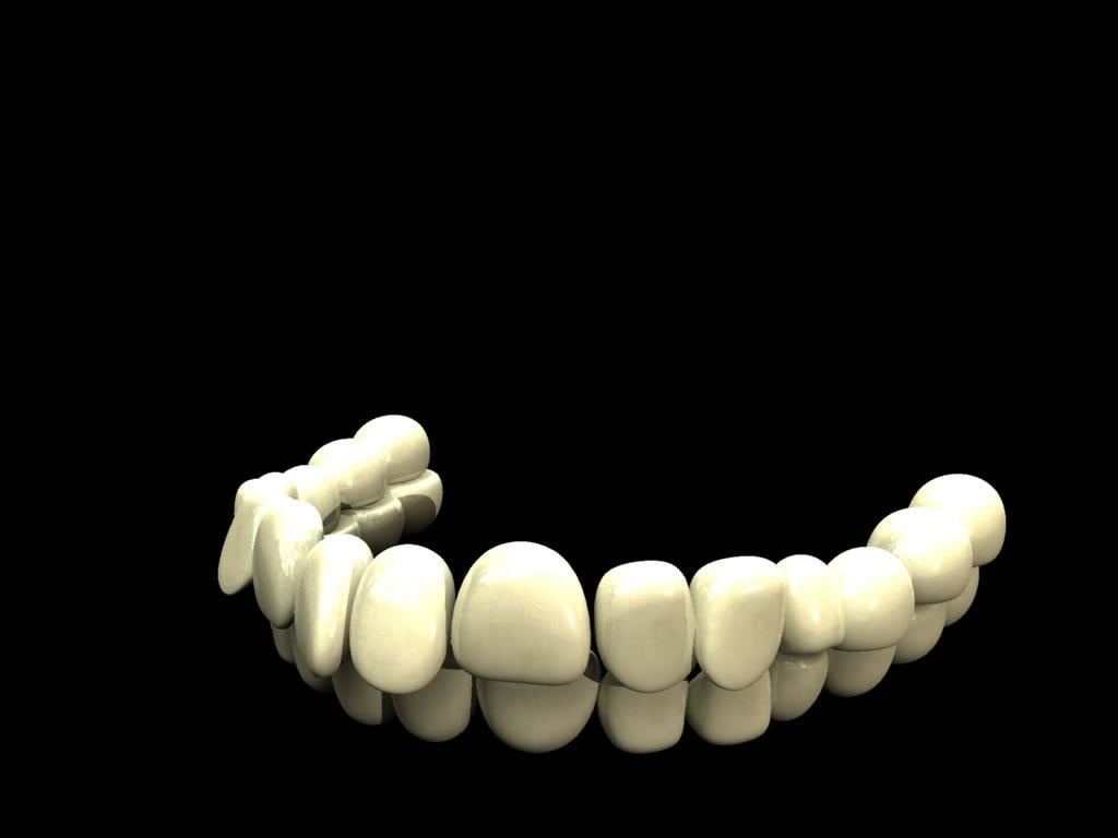 A 3D model of a set of teeth on a black background. - Dentist