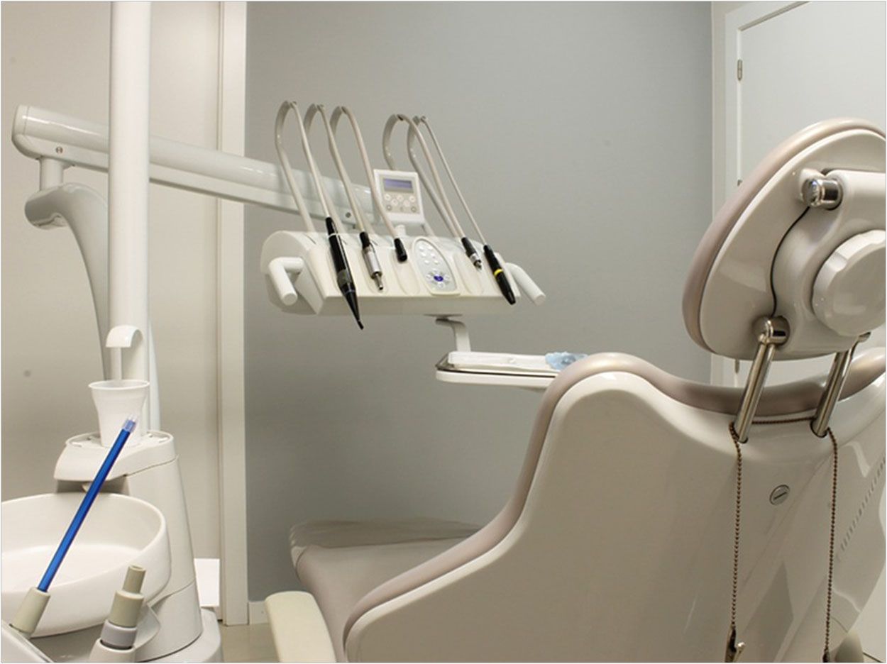 A dental chair with an open mouth - Dentist