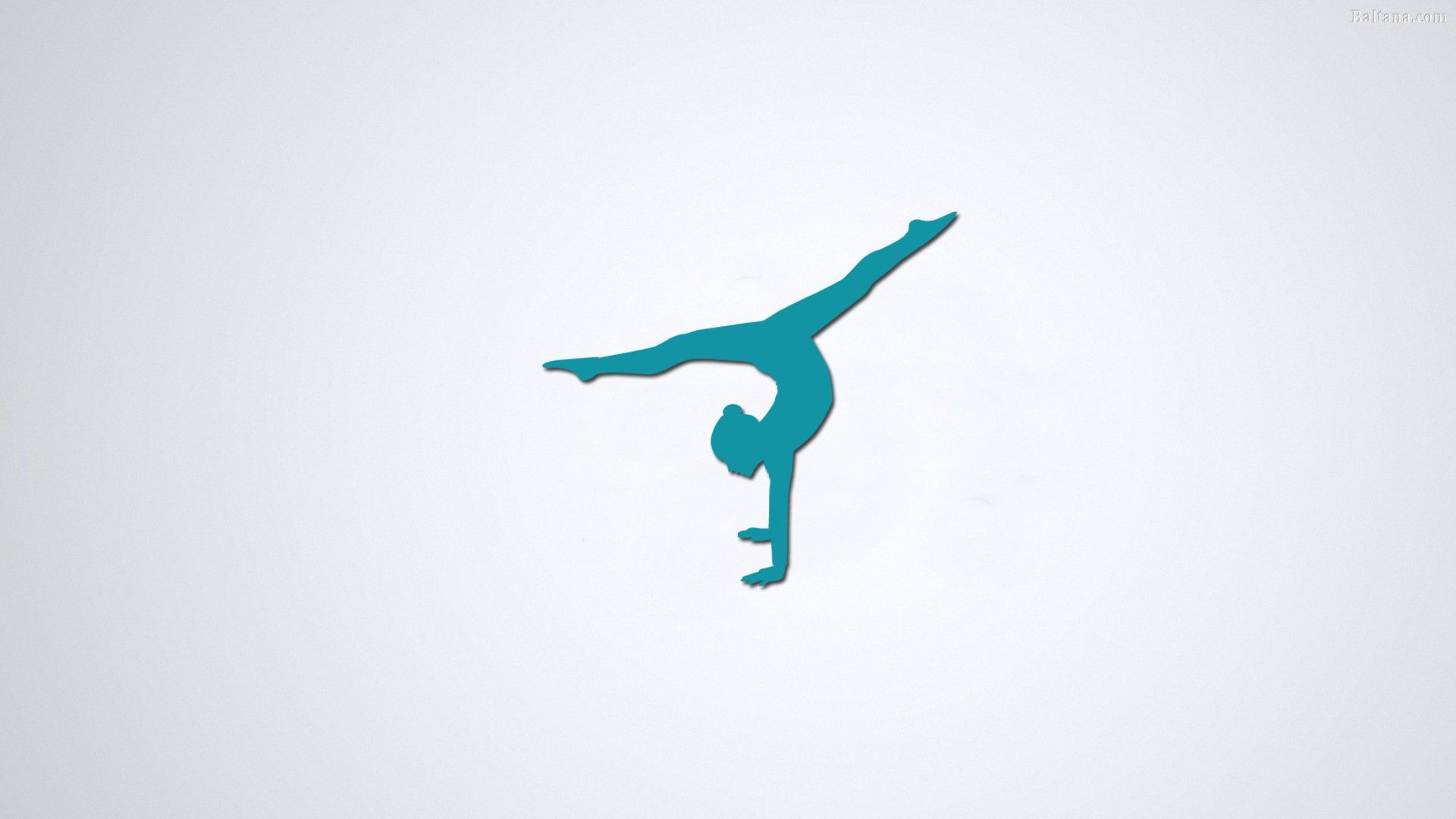 The silhouette of a gymnast doing a handstand - Gymnastics