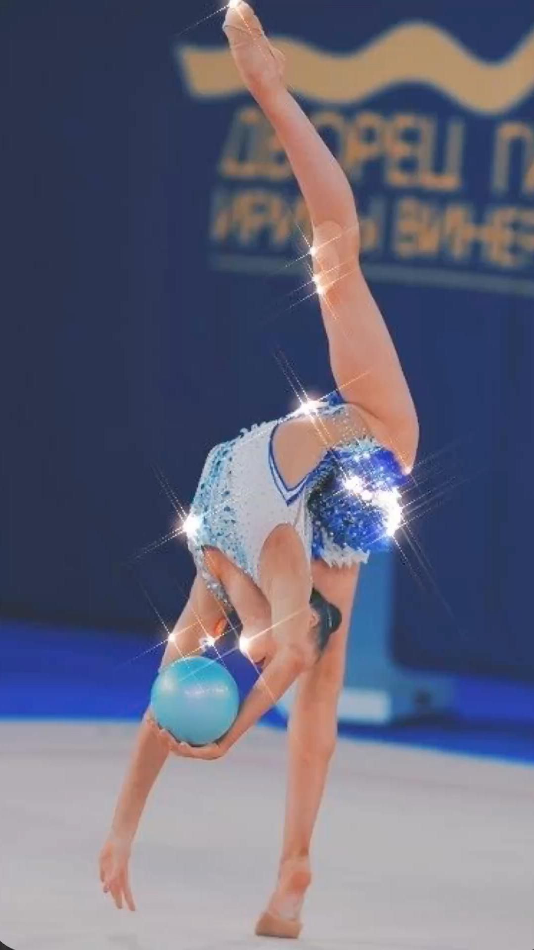 A gymnast performing with a ball - Gymnastics