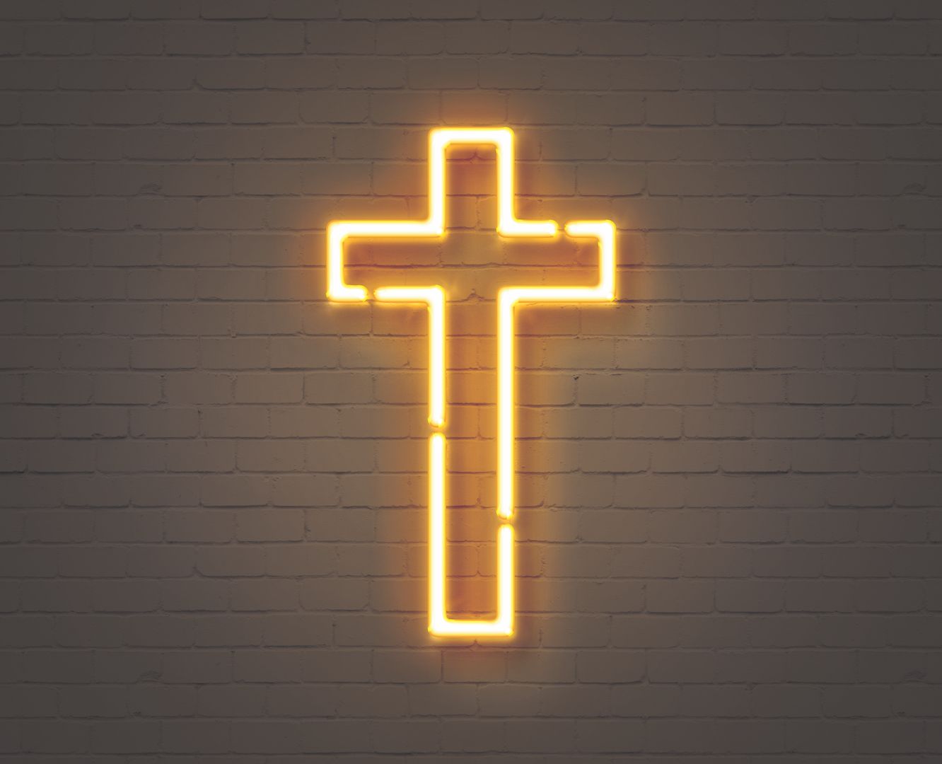 A neon cross on a brick wall - Cross