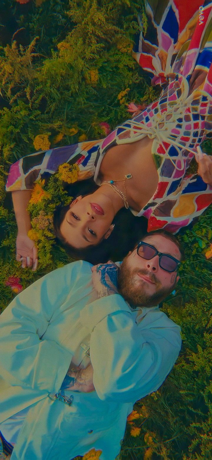 A man and woman laying on the ground - Doja Cat