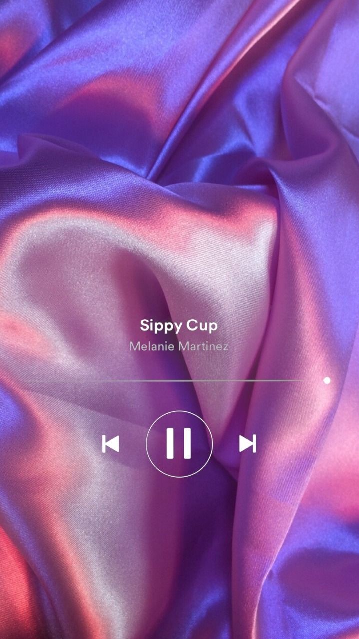 A screenshot of an app with the words slip cup - Melanie Martinez