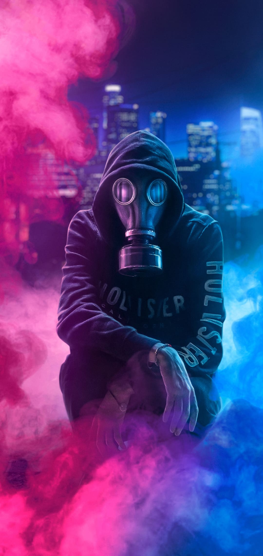 A man wearing gas mask and sitting on the ground - Neon