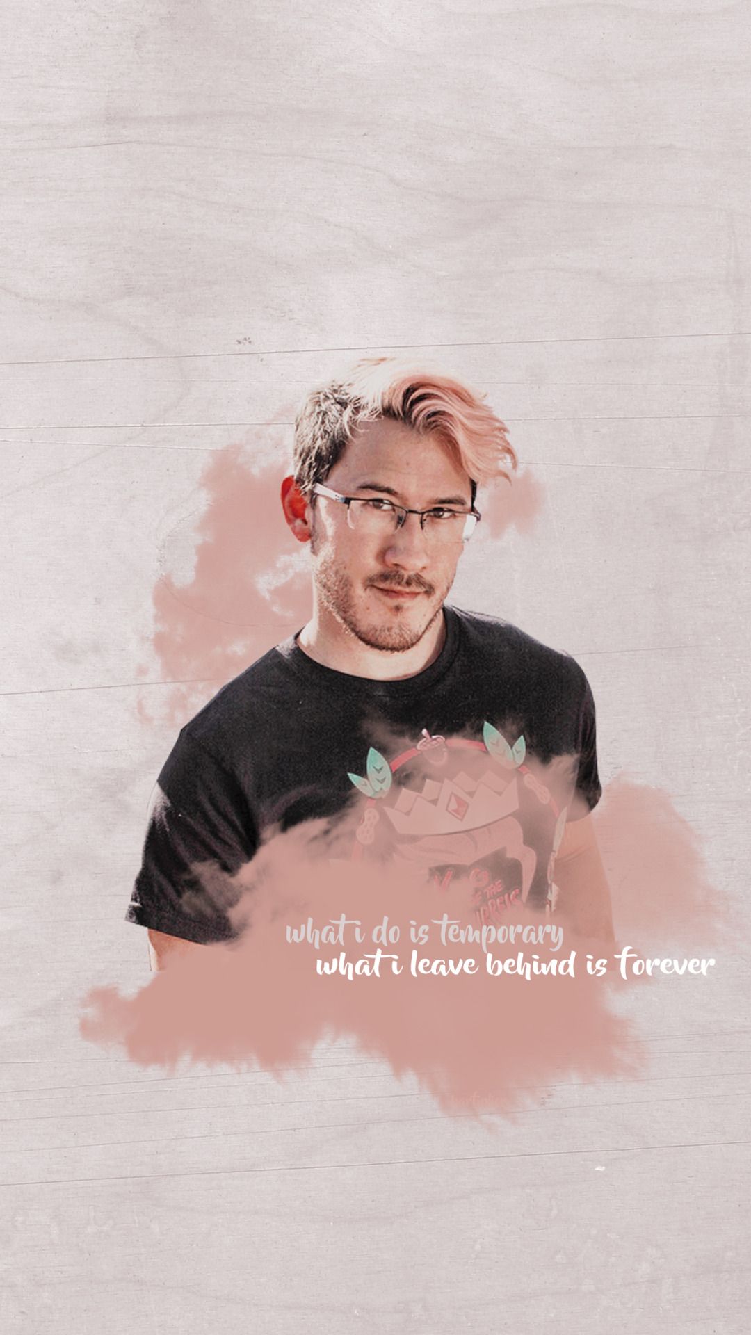 A man with glasses and pink background - Markiplier