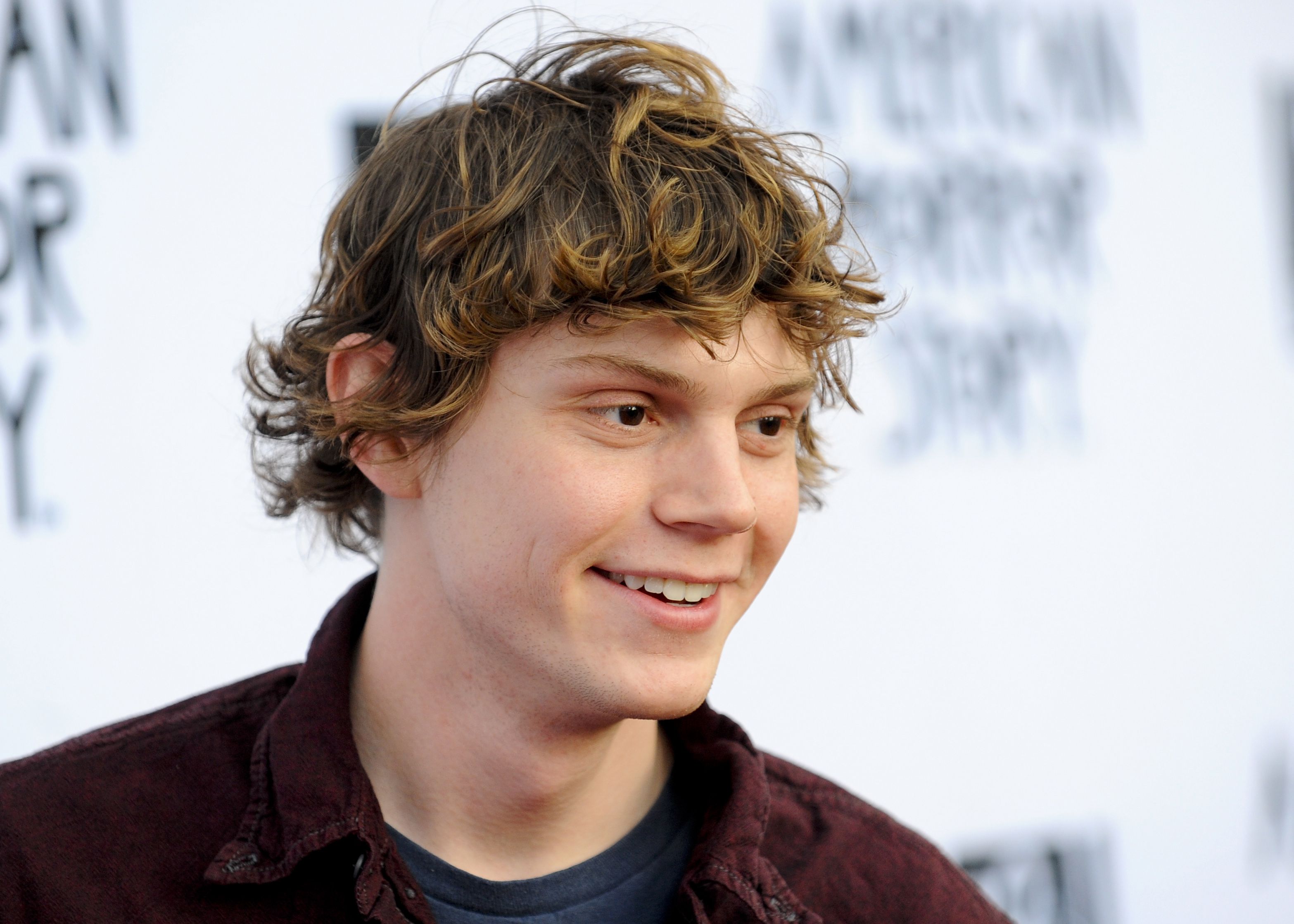 Evan Peters, who plays Tate in the TV series 'American Horror Story', arrives at the season 4 premiere of 'American Horror Story: Coven' at the Ziegfeld Theatre on October 17, 2013 in New York City. - Evan Peters