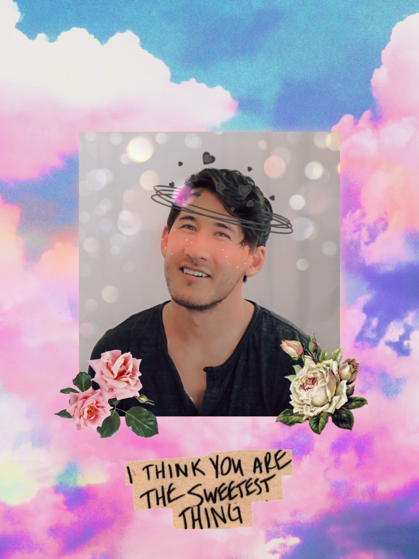 A man is smiling and has flowers on his head - Markiplier
