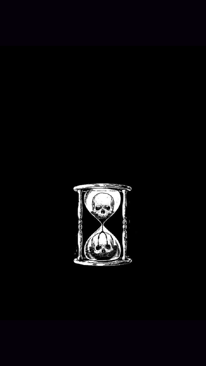 A black and white picture of a skull in an hourglass - Markiplier