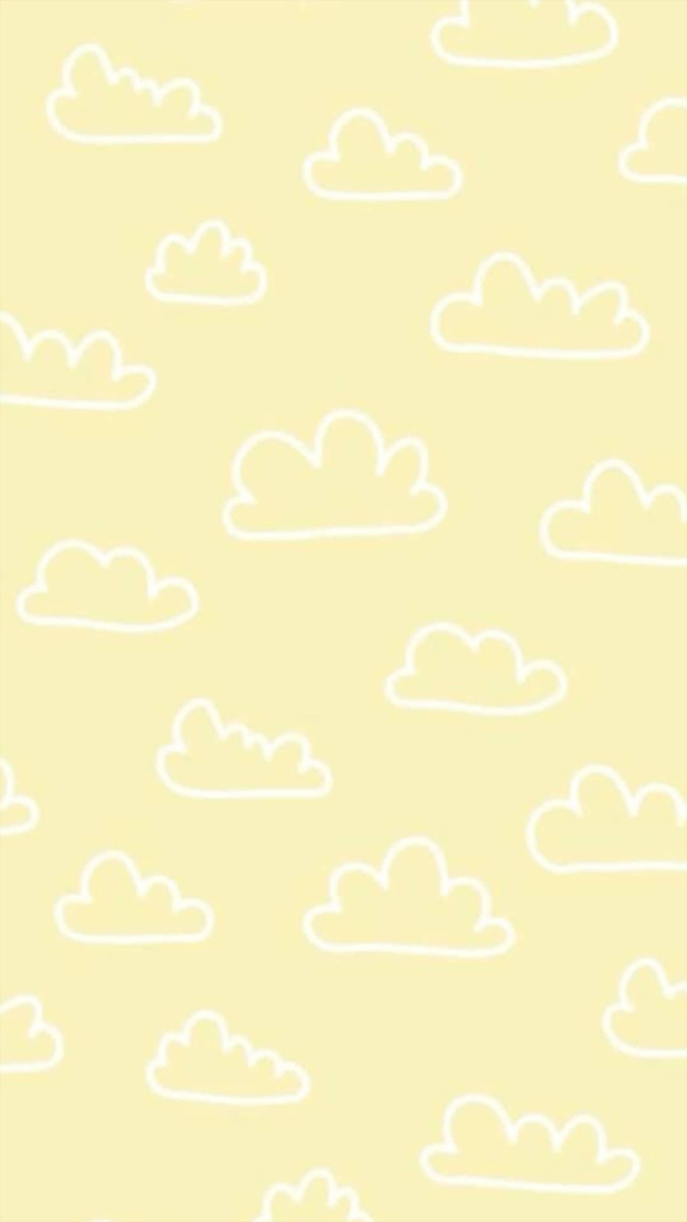 A yellow background with white clouds - Pattern