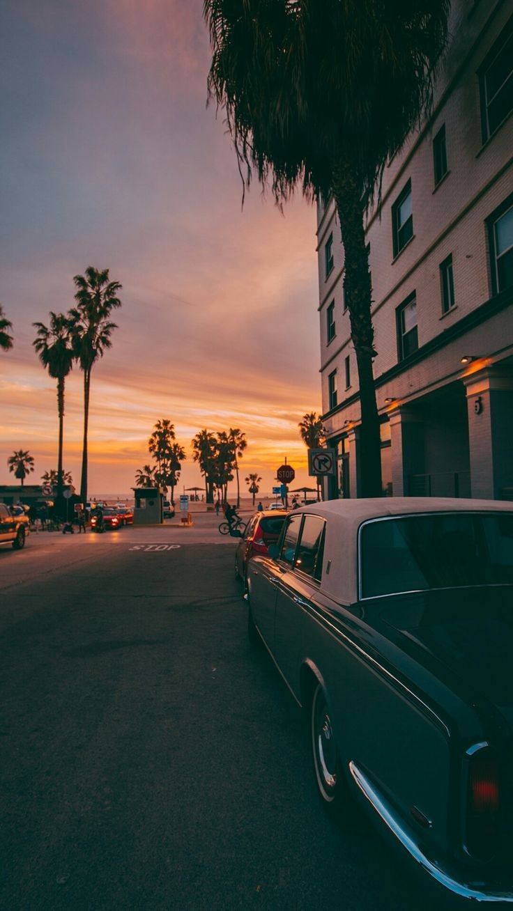 An old car parked on the side of the road - California