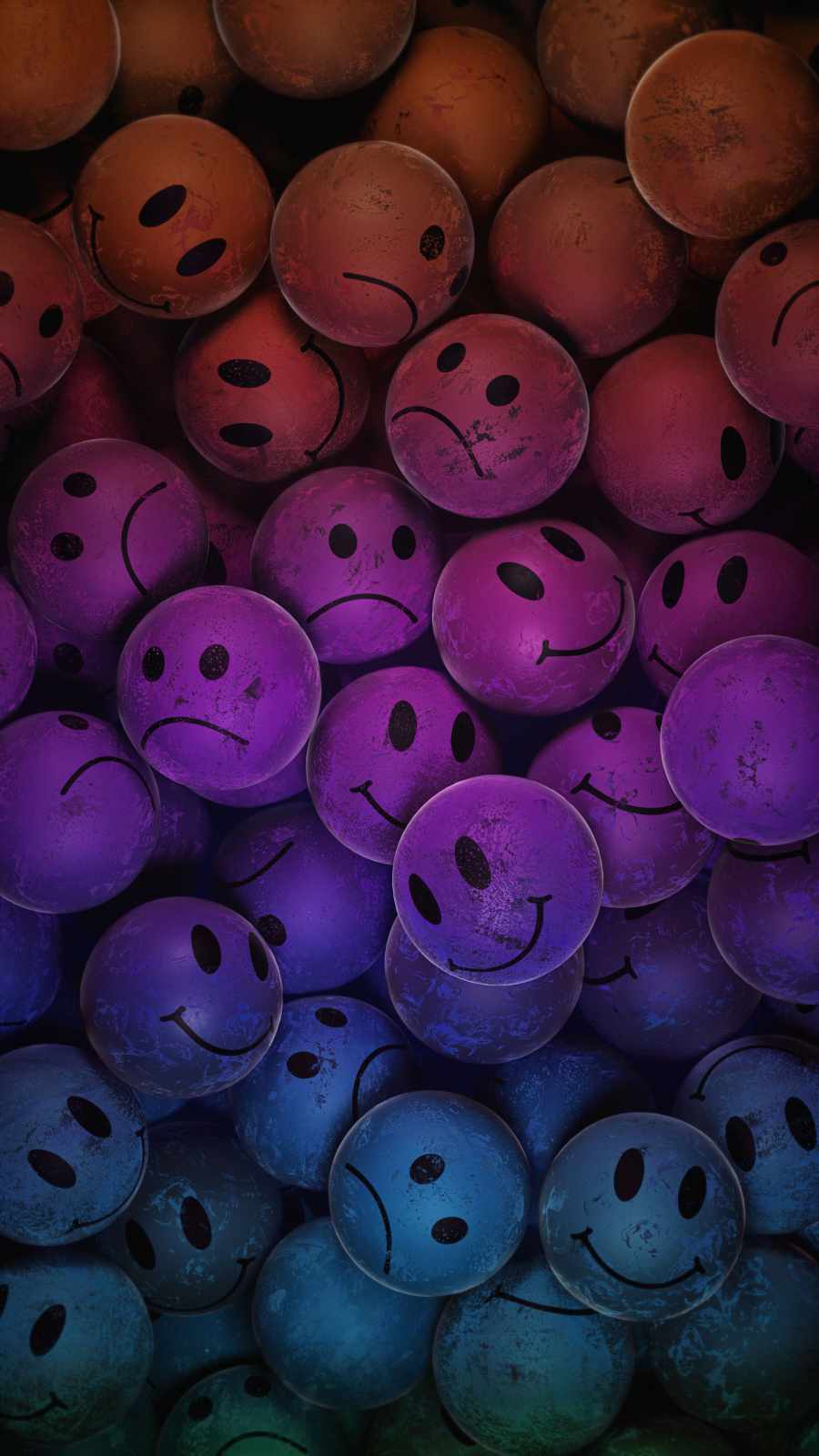 A group of colorful smiley faces on the ground - Sad, happy