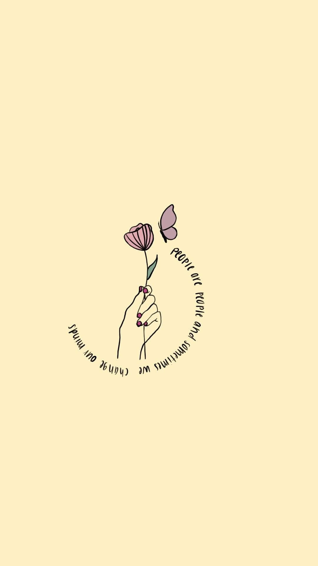 A hand holding flowers with the words, 'a flower is not just for decoration' - Taylor Swift