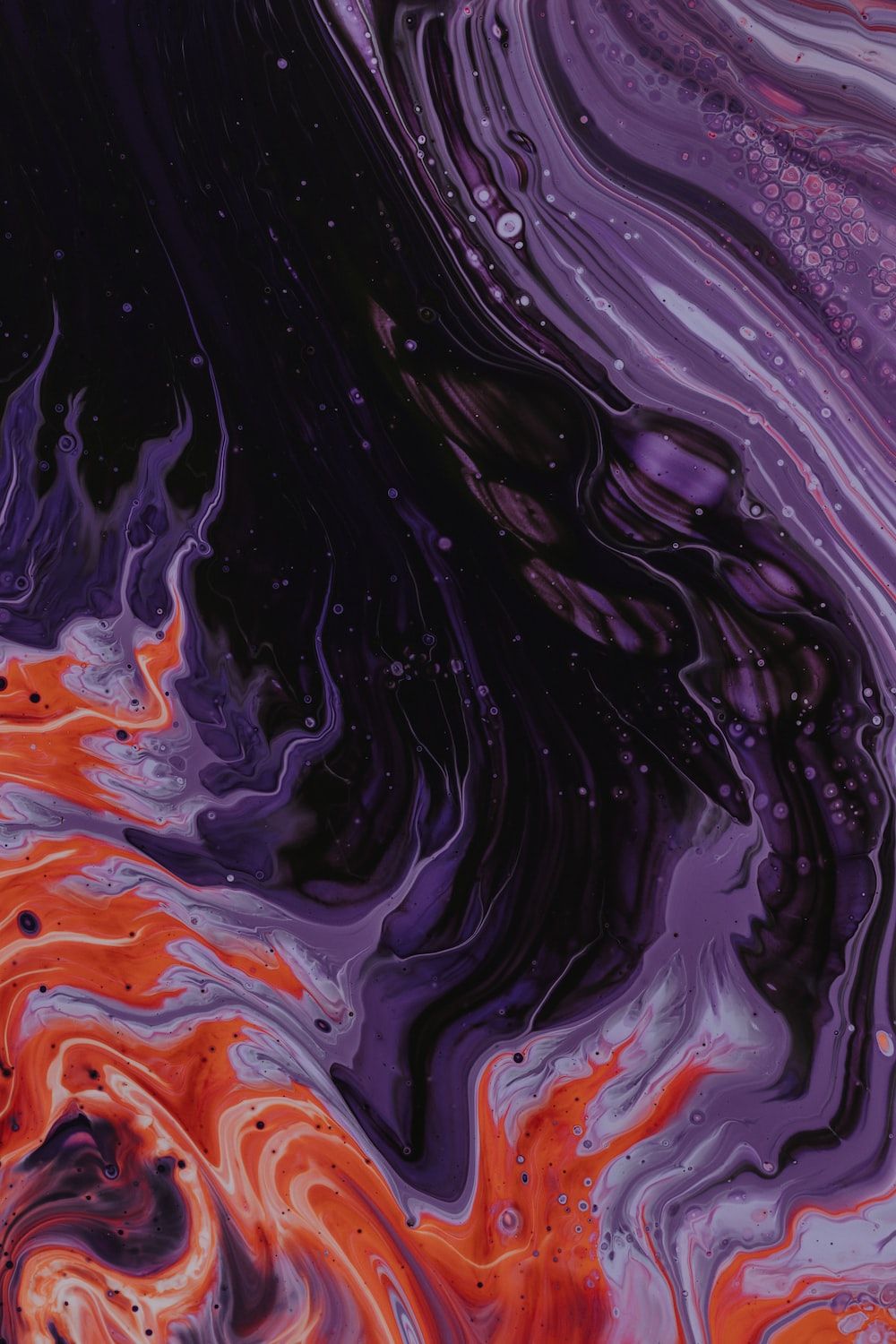 A close up of an orange and purple liquid - Star Wars