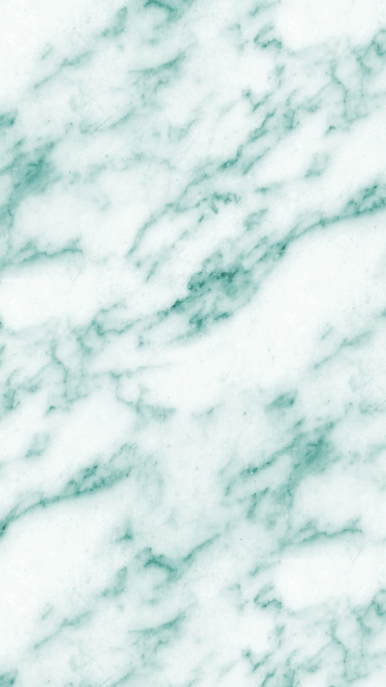 A close up of marble with green and white - Marble