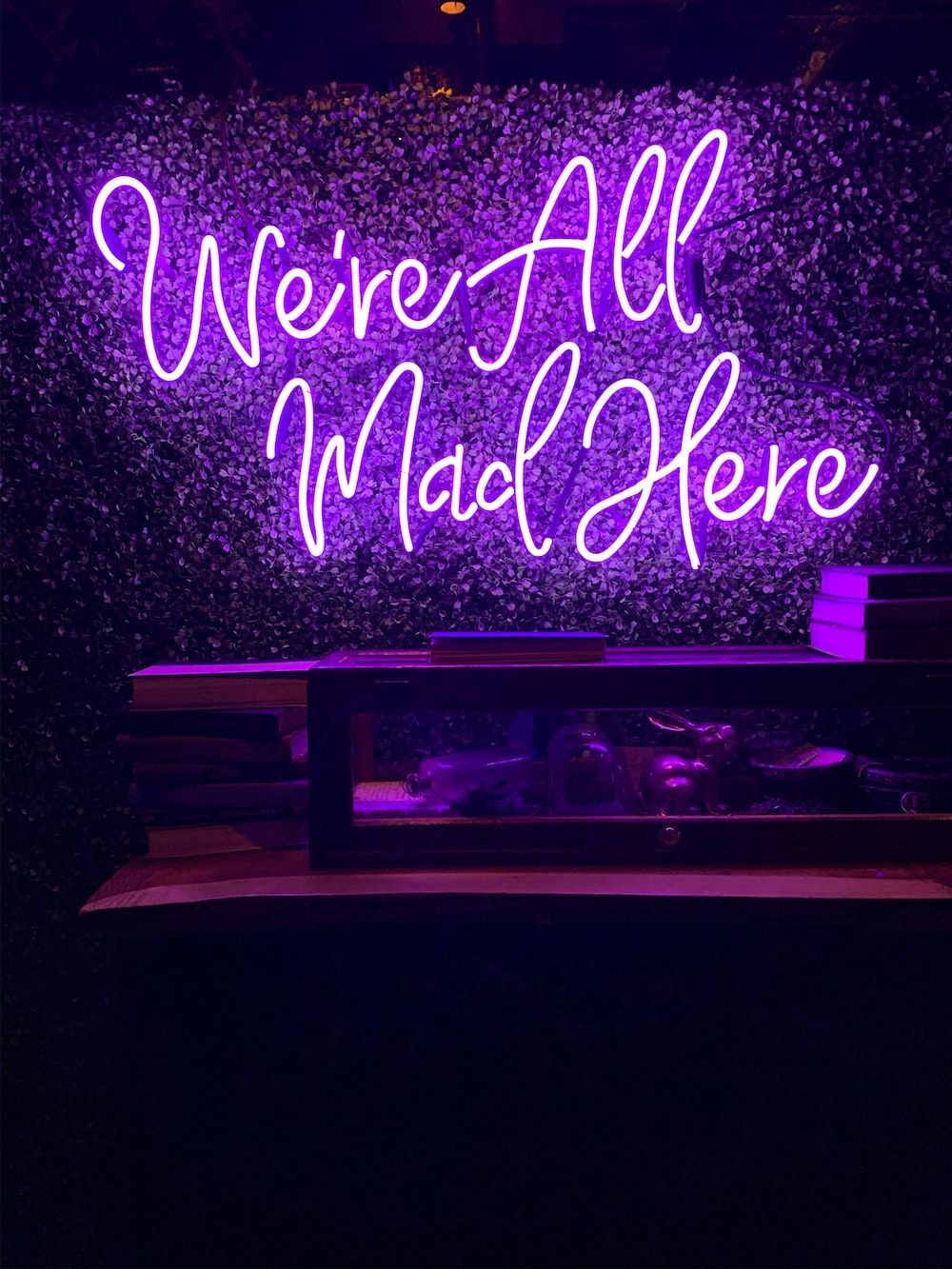A purple neon sign that says 