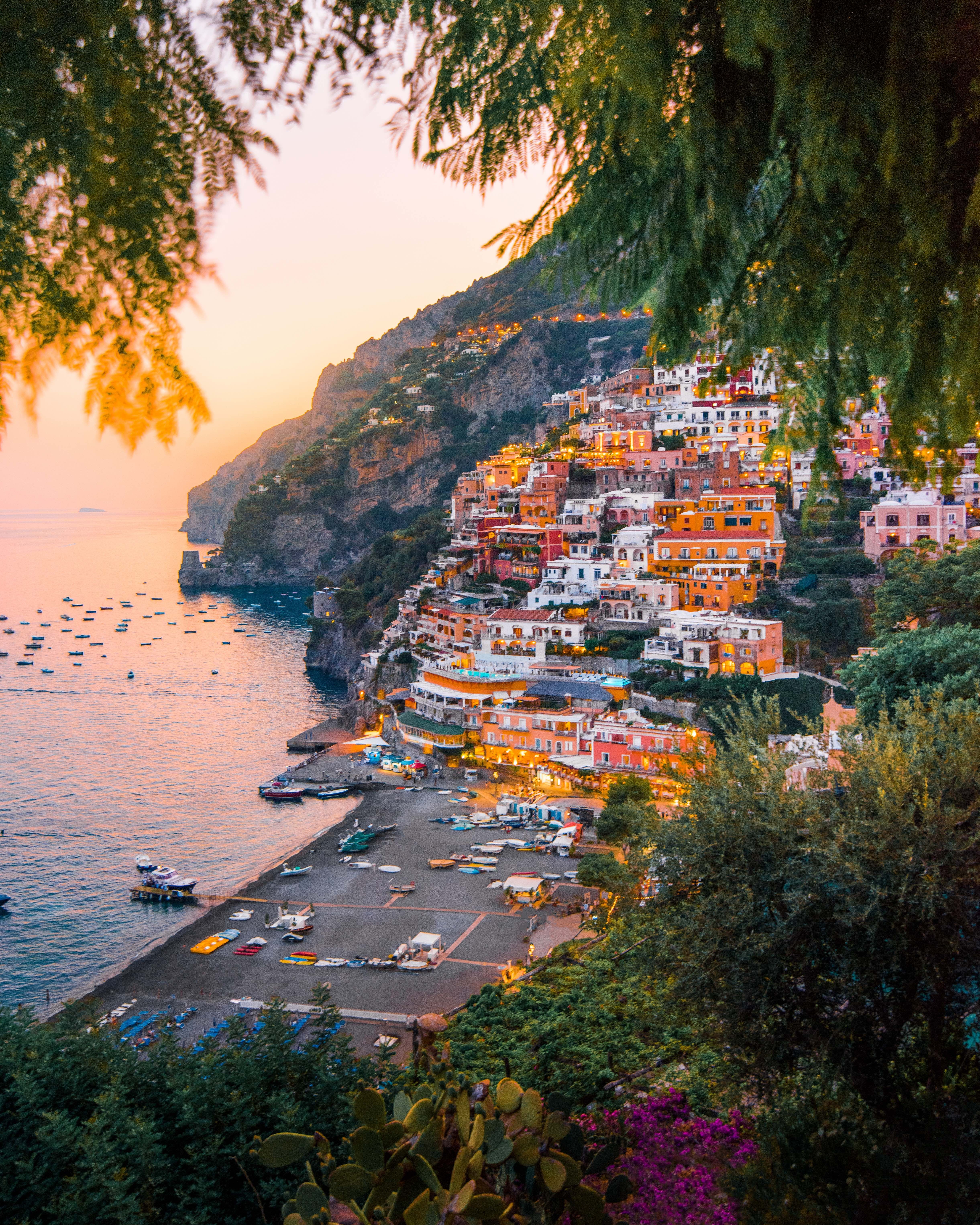 A city on the water at sunset - Travel, Italy