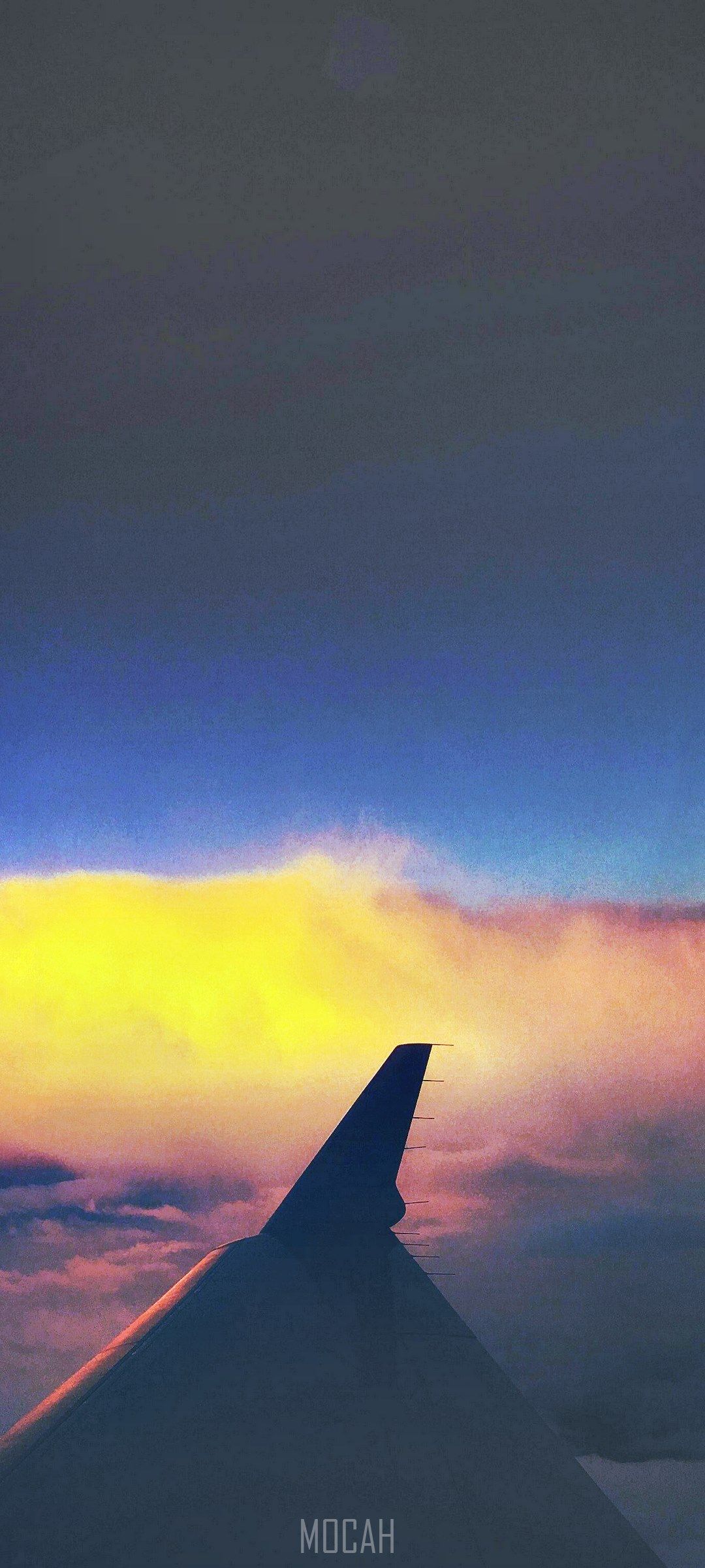 IPhone wallpaper of a plane wing with a sunset in the background - Travel