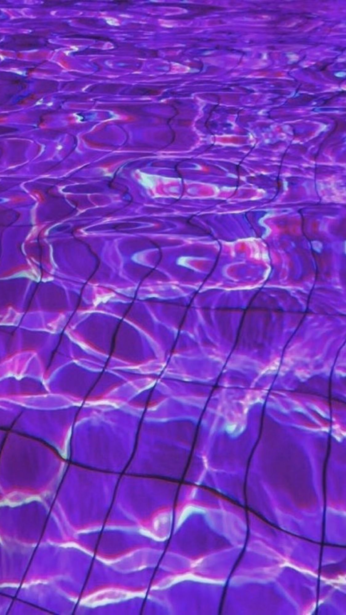 A pool with a purple and blue color scheme - Swimming pool, water