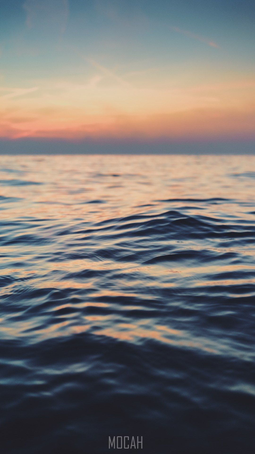 IPhone wallpaper of a calm sea with a sunset in the background - Water
