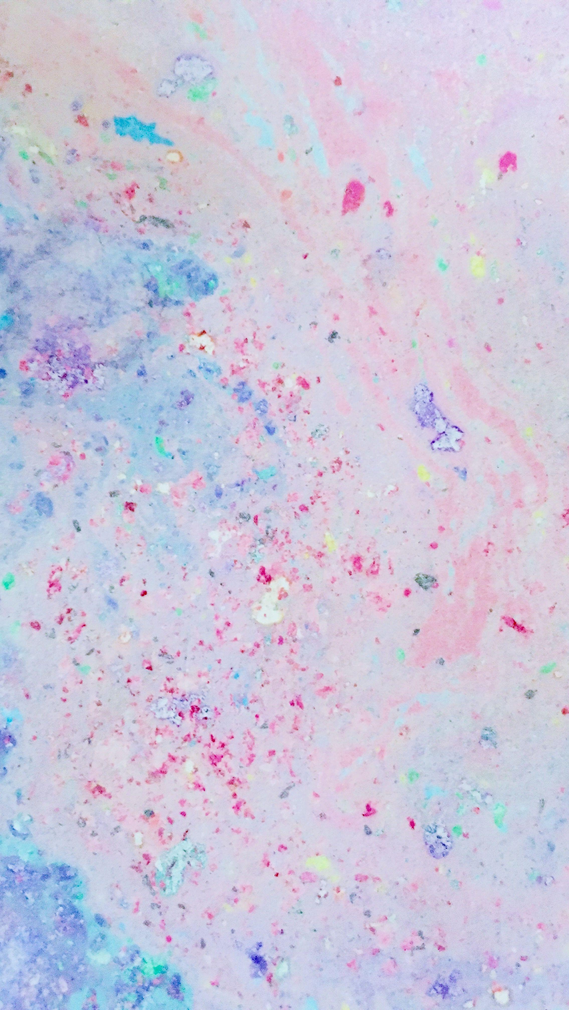 A photo of a piece of paper with pastel colors and glitter on it - Pastel
