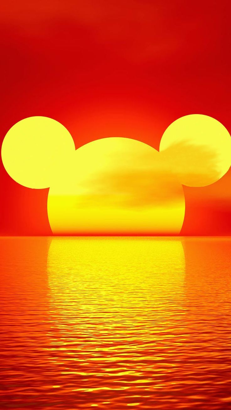 A sunset with two mouse ears in the sky - Mickey Mouse