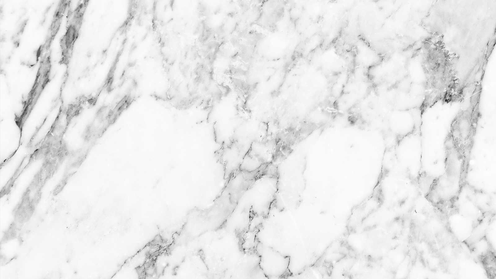 A white and grey marble surface with a lot of纹理. - White