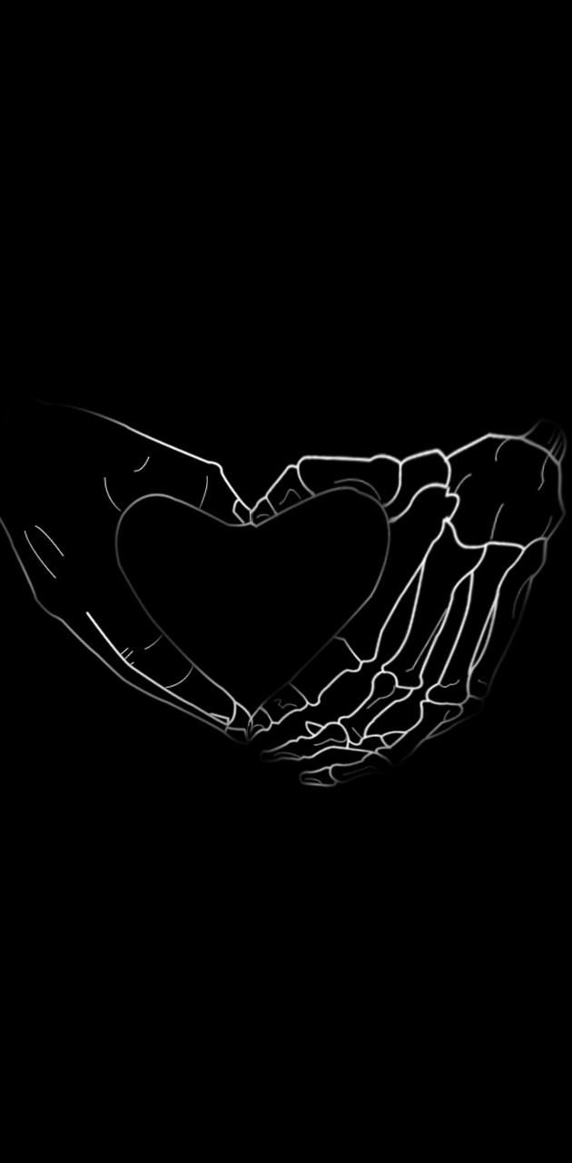 Black and white skeleton hands holding a heart - Black heart