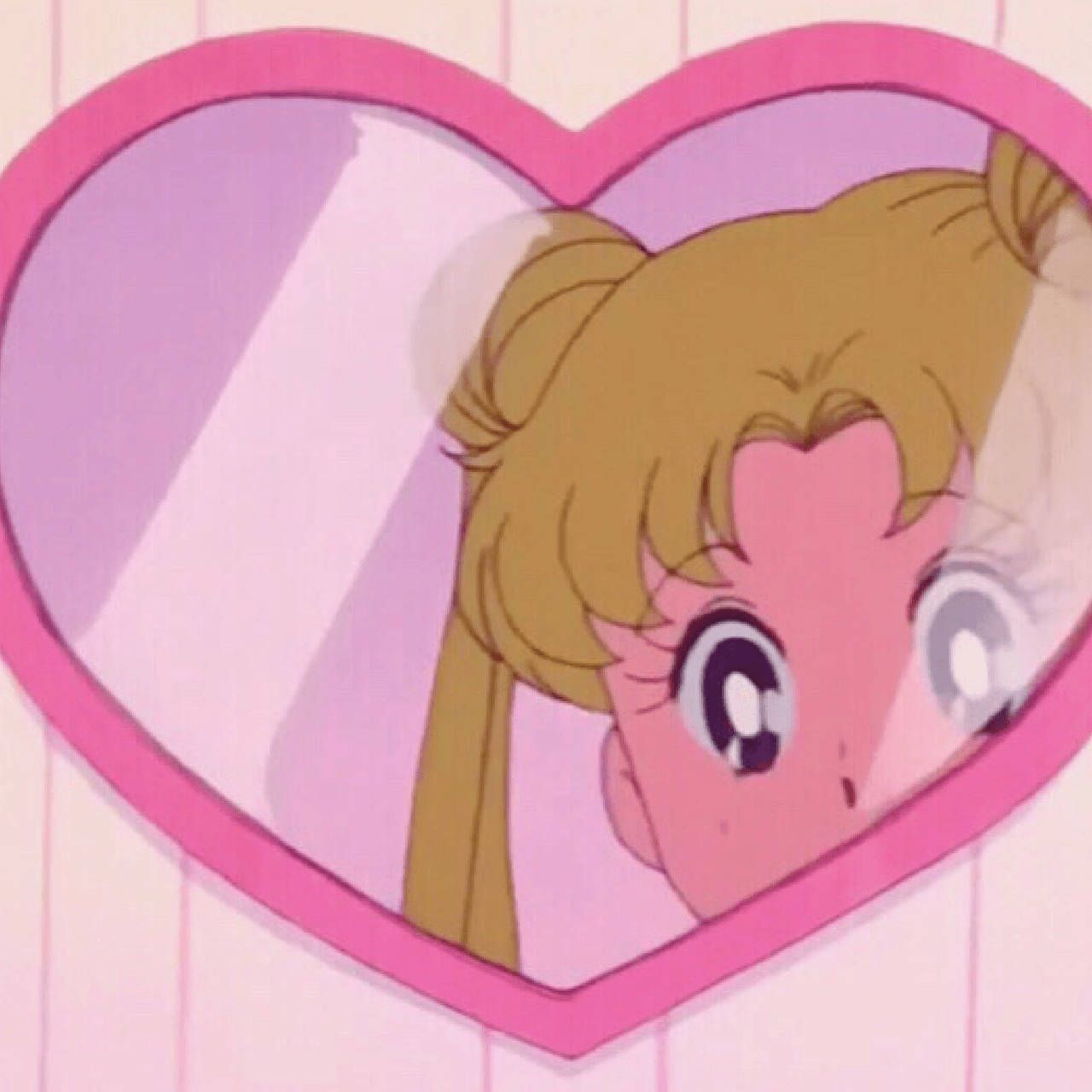 A cartoon character is looking at her reflection in the mirror - Sailor Moon