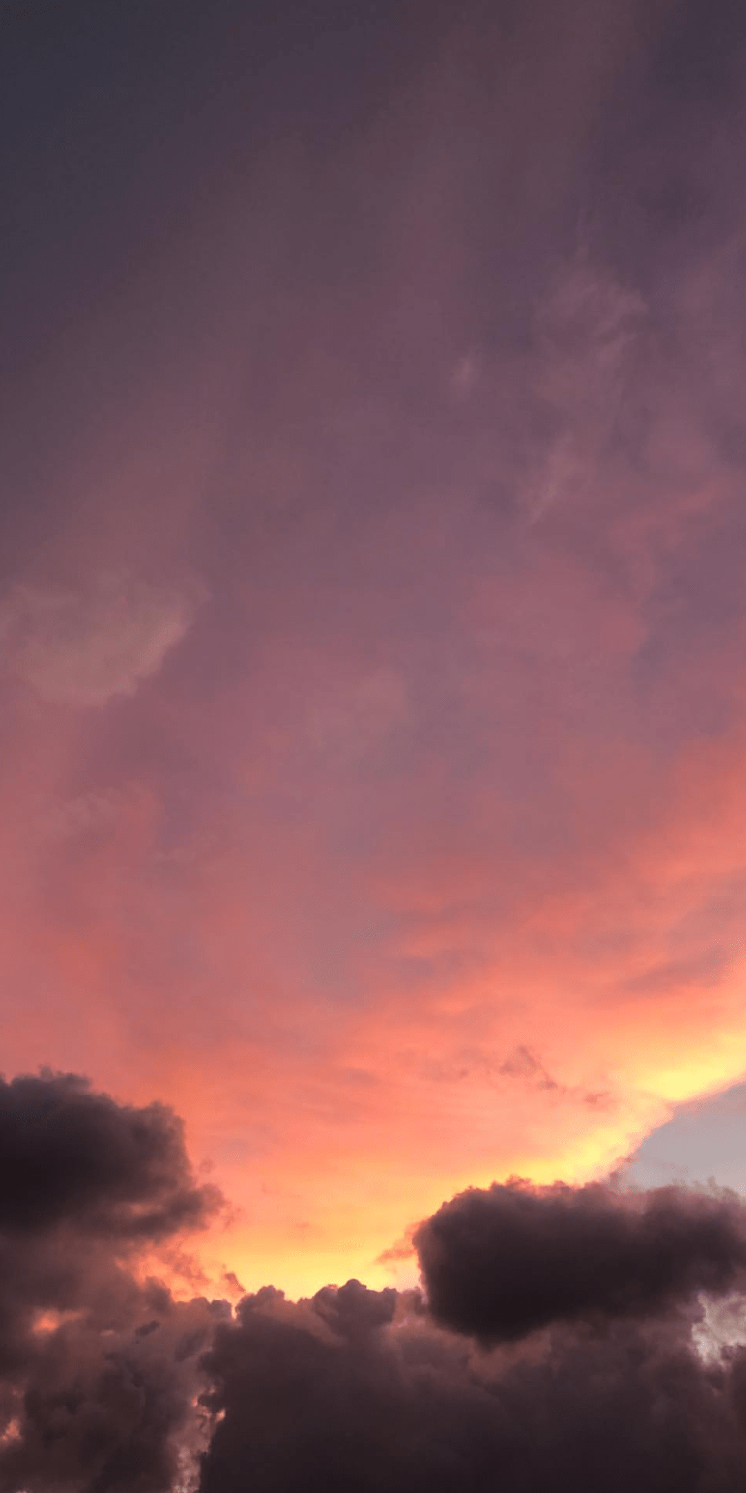 A sky with clouds during sunset - Sky