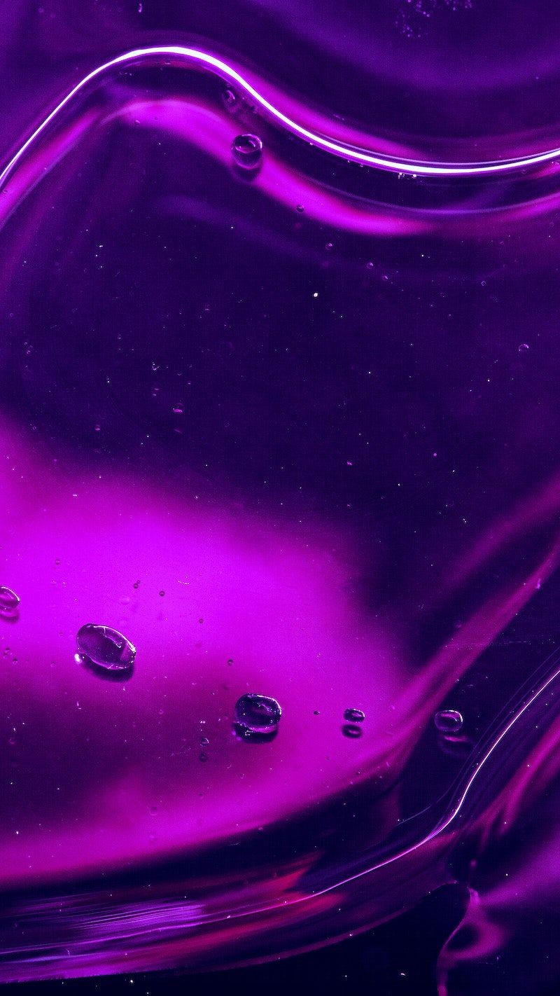 A purple liquid with water drops on it - Dark purple