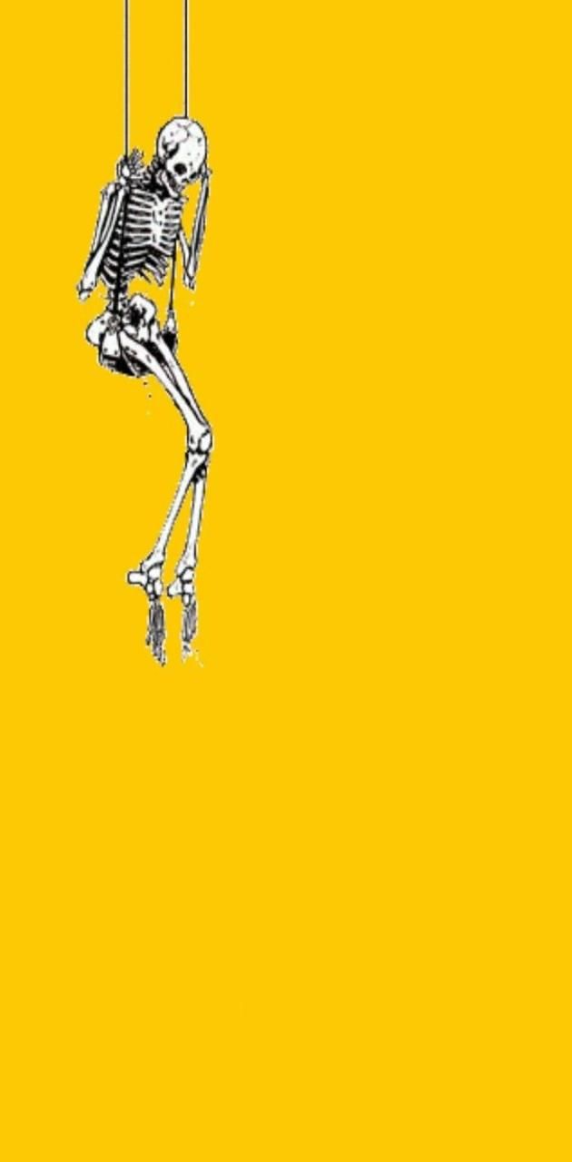 A skeleton hanging from a rope with a yellow background - Skeleton