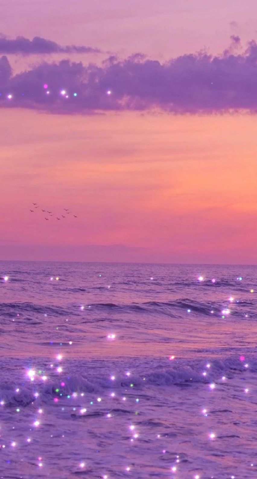 A purple sky with stars and birds flying over the ocean - TikTok, glitter