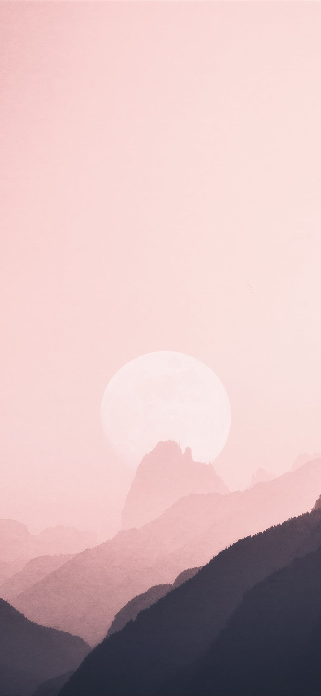 A pink sky with mountains in the background - TikTok
