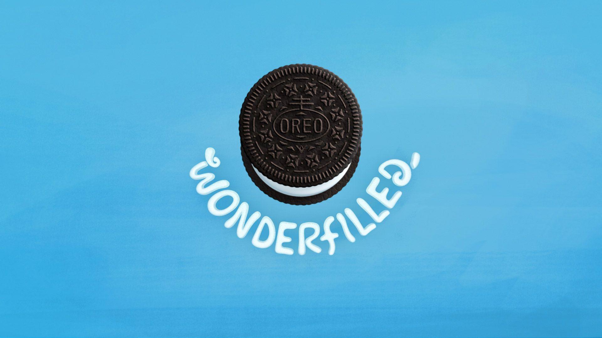 A blue background with an oreo cookie on it - Oreo
