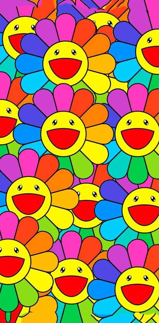 A colorful flower pattern with smiling faces - Indie