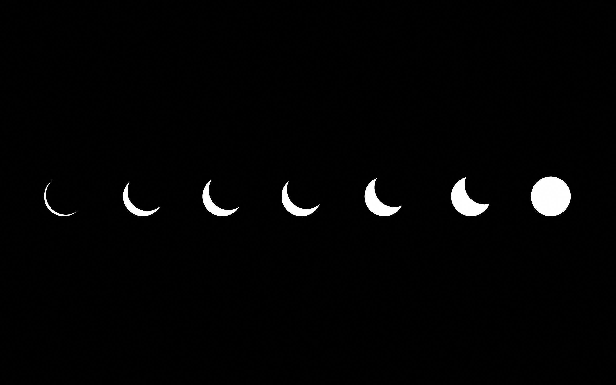 A series of eight white crescent moons on a black background. - Indie