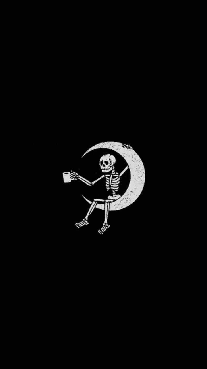 A skeleton holding a cup of coffee sitting on a crescent moon - Skeleton