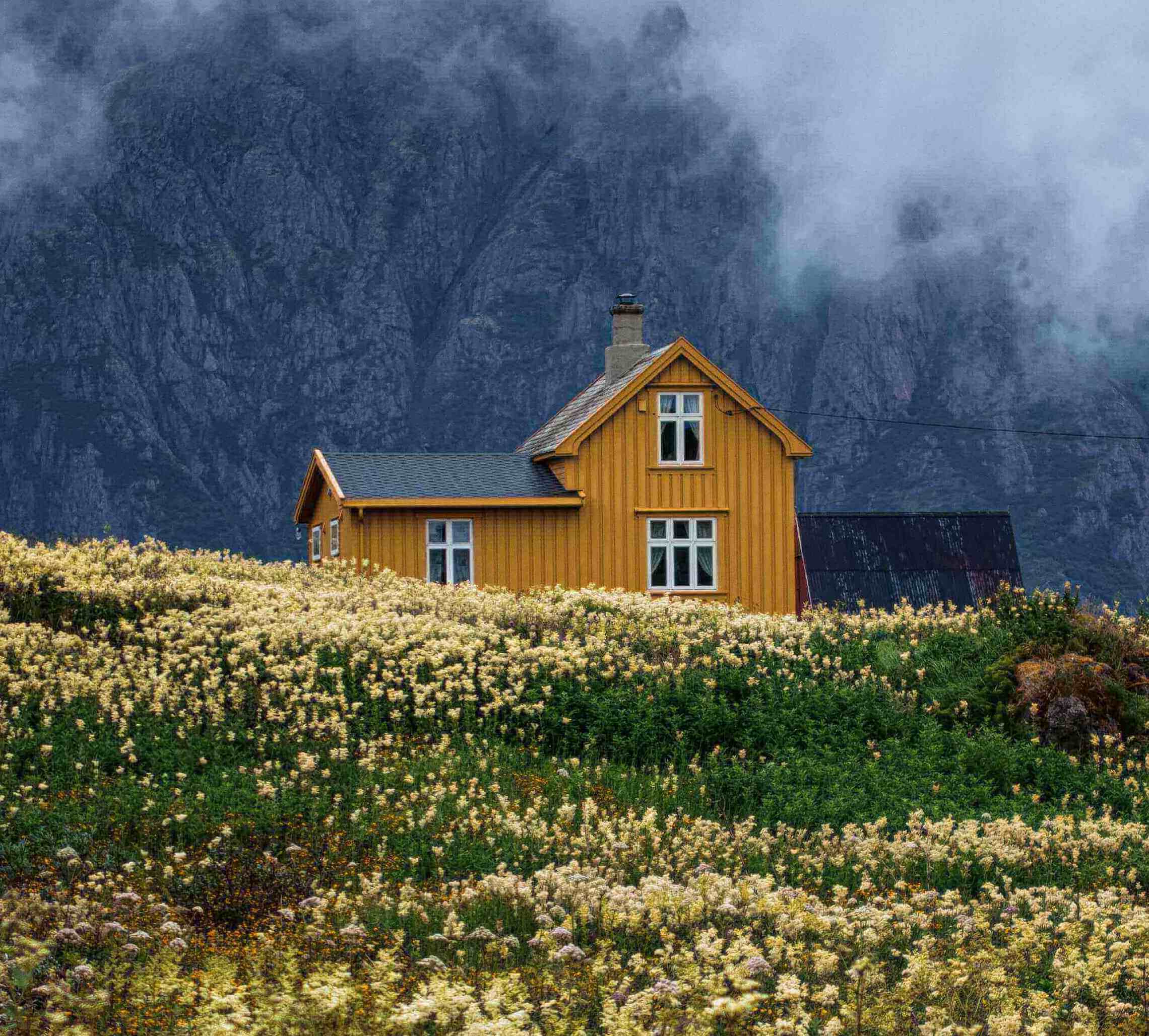 A yellow house in the mountains. - Cottagecore