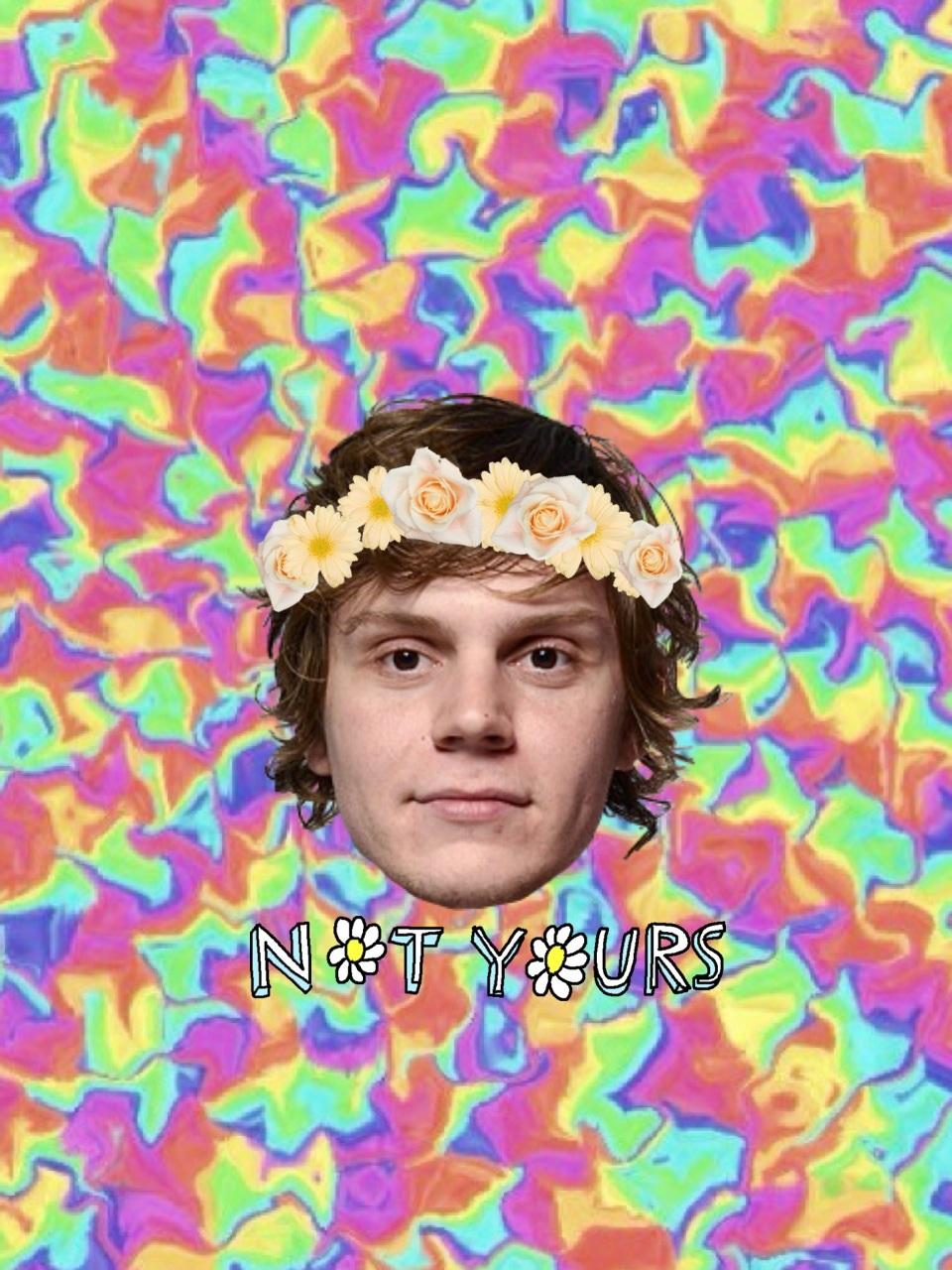 A colorful image with a man's face wearing a flower crown and the words 