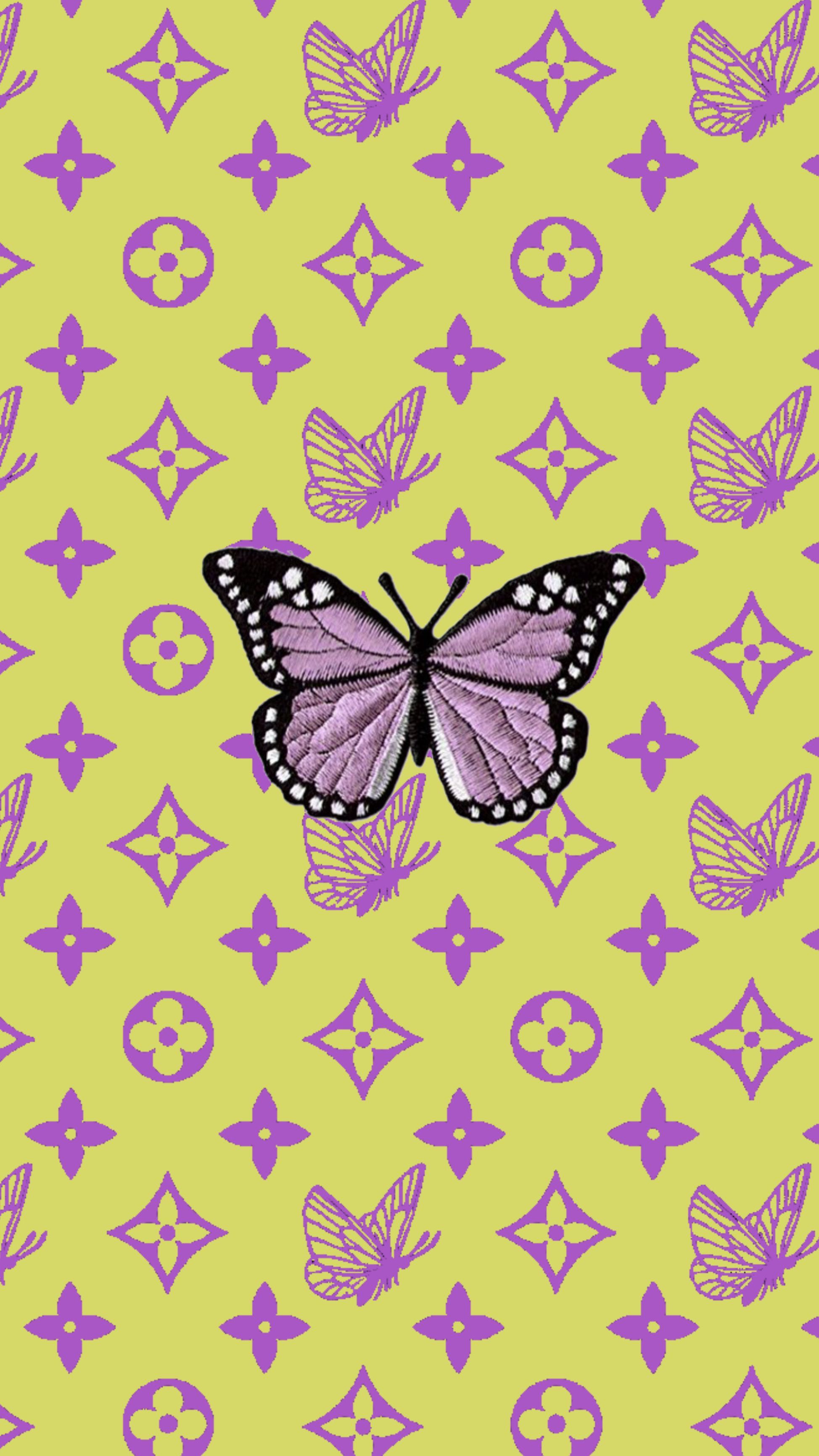 A butterfly on top of some purple and yellow flowers - Louis Vuitton