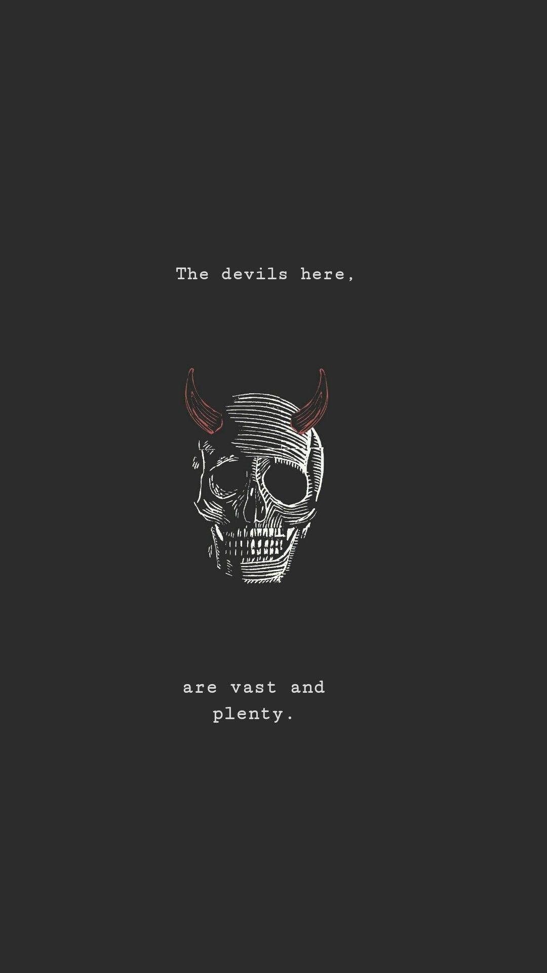 A skull with horns and the words 