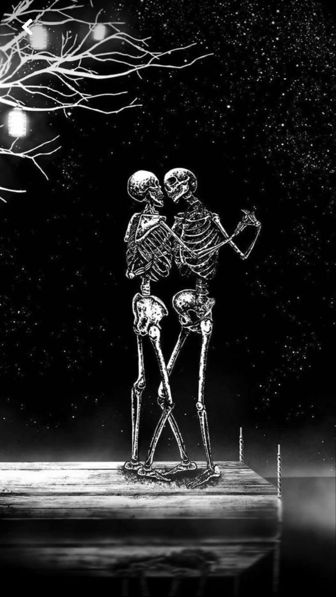 A black and white photo of two skeletons dancing - Skeleton
