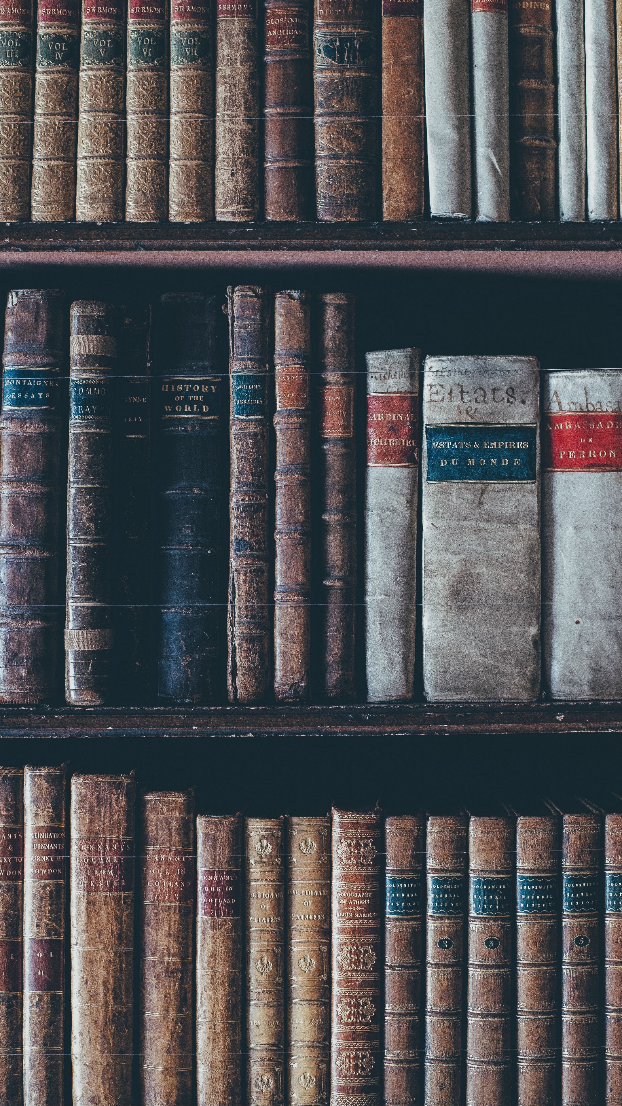 A bookshelf with many books on it - Library