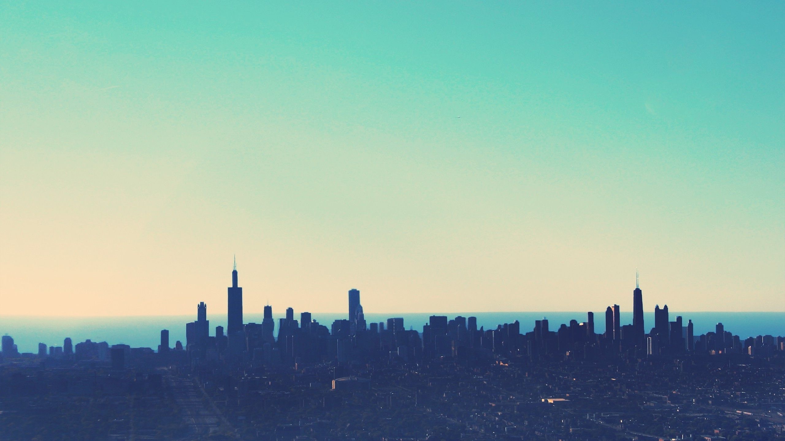 A photo of the Chicago skyline at sunset. - Turquoise, cityscape